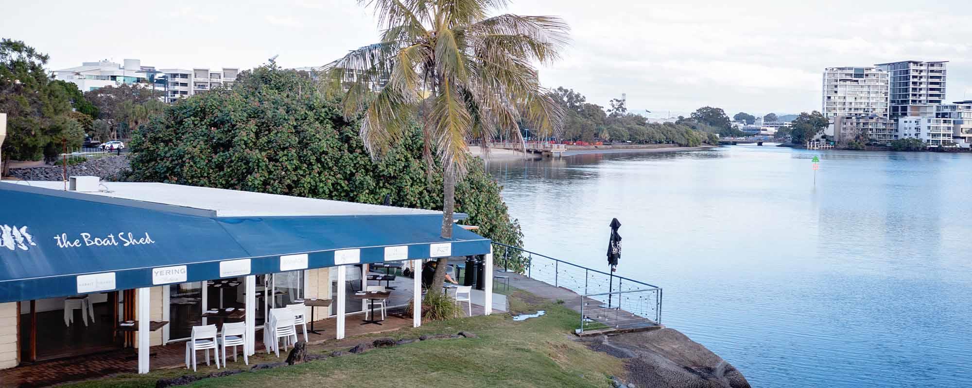 aerial view of the boat shed next to cotton tree